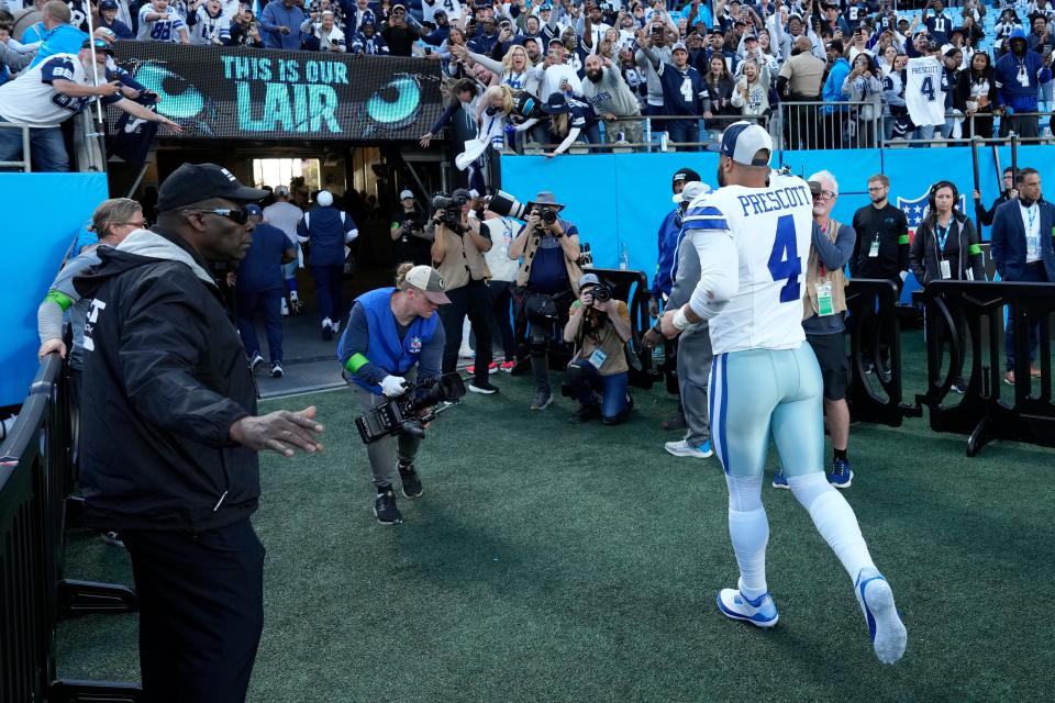 Nov 19, 2023; Charlotte, North Carolina, USA; Dallas Cowboys quarterback Dak Prescott (4) runs off the field after the game at Bank of America Stadium. Mandatory Credit: Bob Donnan-USA TODAY Sports