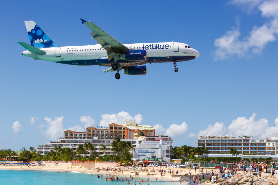 Sint Maarten, Netherlands Antilles - September 15, 2016: JetBlue Airbus A320 airplane at Sint Maarten Airport (SXM) in the Caribbean.