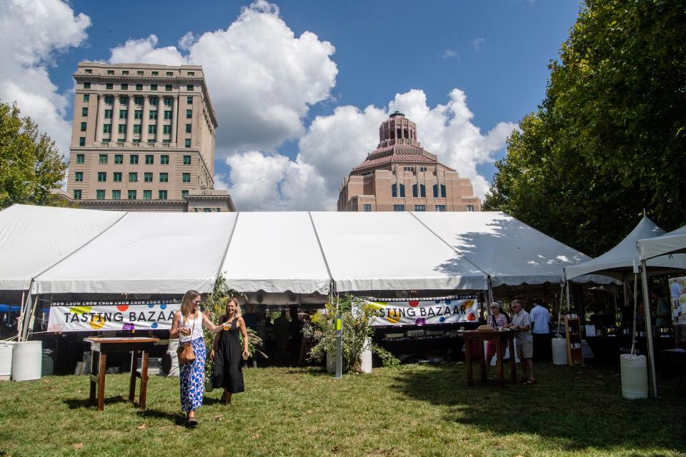 An event tent at Chow Chow Food and Culture Festival in Pack Square Park in September 2023.