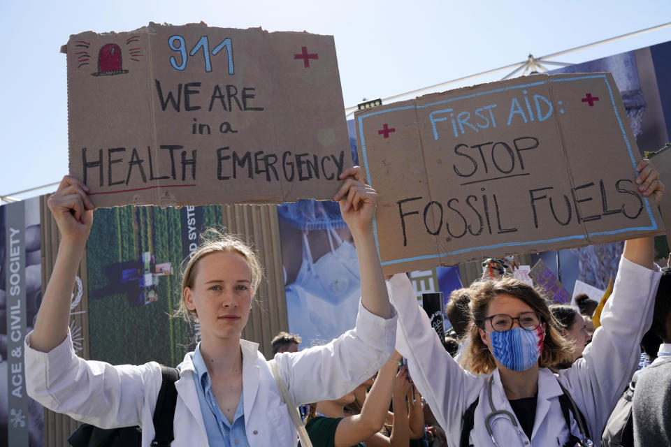 Demonstrators participate in a Fridays for Future protest calling for money for climate action at the COP27 U.N. Climate Summit, Friday, Nov. 11, 2022, in Sharm el-Sheikh, Egypt. (AP Photo/Peter Dejong)