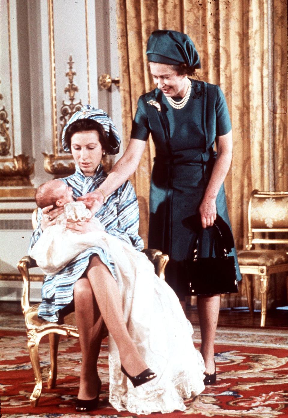 <p>Introducing Queen Elizabeth to her first grandchild, Peter Philips.</p>