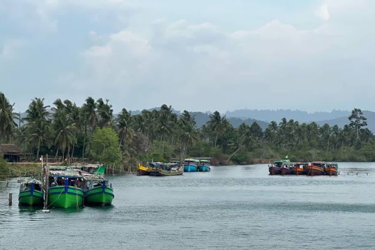 This picture shows fishing boats anchored near Gwa township in Myanmar’s Rakhine state on 11 May 2023 after Cyclone Mocha, the Bay of Bengal’s first cyclone of the year formed (AFP via Getty Images)