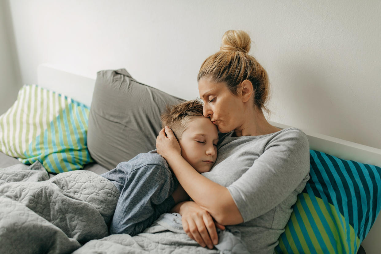 Wondering about co-sleeping with an adolescent? Here are some tips to have in mind to make sure it's still working for everyone. (Photo: supersizer via Getty Images)