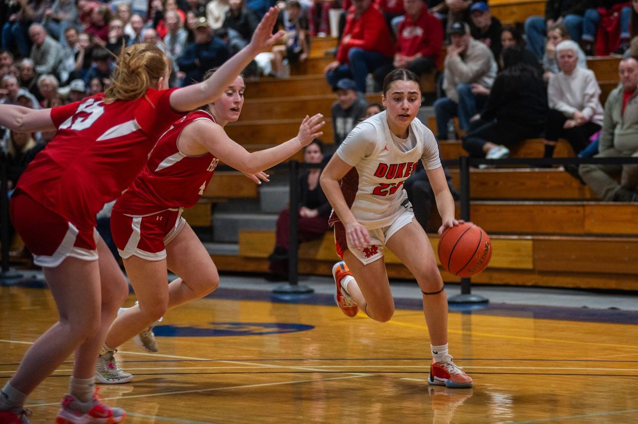 Marlboro's Gabby Murphy, right, drives up court during the Section 9 Class A girls basketball championship game at Mount Saint Mary College in Newburgh, NY on Friday, March 1, 2024.