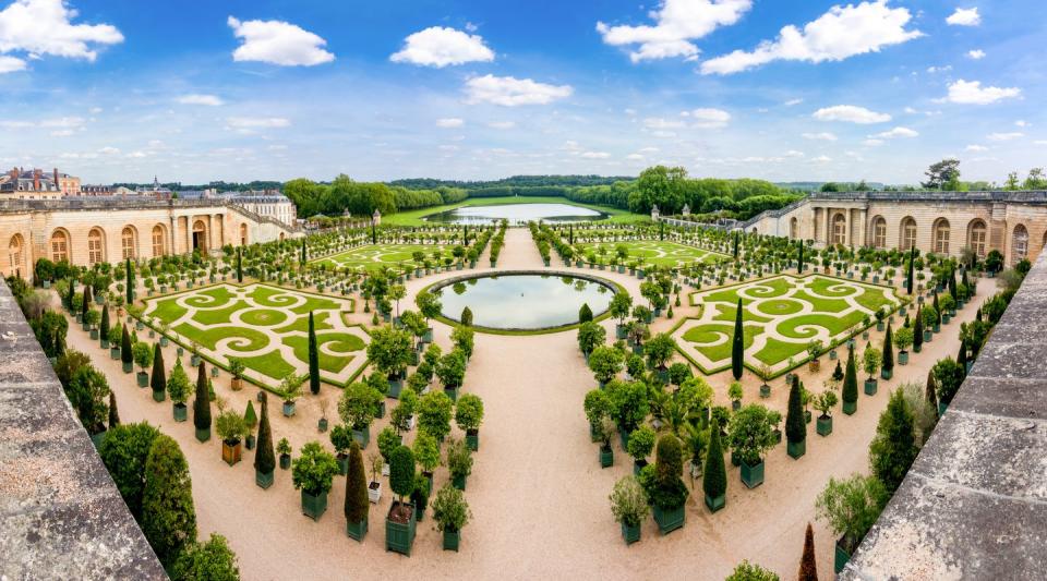 <p>The lavish network of trimmed topiaries, storied fountains and sculptures, and fragrant flower beds at the <a href="http://en.chateauversailles.fr/" rel="nofollow noopener" target="_blank" data-ylk="slk:Palace of Versailles;elm:context_link;itc:0;sec:content-canvas" class="link ">Palace of Versailles </a>make up one of the most famous gardens in the world. King Louis XIV of France commissioned famous French landscape designer André Le Nôtre to renovate the <a href="http://en.chateauversailles.fr/discover/estate/gardens" rel="nofollow noopener" target="_blank" data-ylk="slk:gardens of Versailles;elm:context_link;itc:0;sec:content-canvas" class="link ">gardens of Versailles </a>in 1661 and became the crowning jewel of his reign. Every 100 years, the gardens needs to be replanted to maintain its youthful, flourishing appearance. </p>