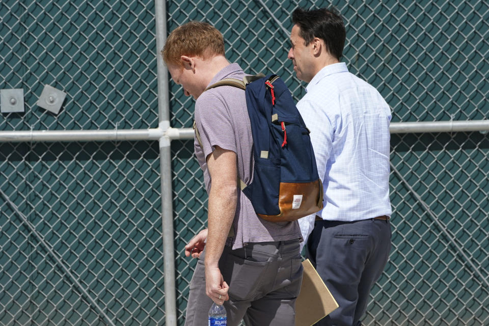 Major League Baseball Executive Vice President Morgan Sword, left, and Deputy Commissioner Dan Halem, right, arrive for negotiations with the players union in an attempt to reach an agreement to salvage March 31 openers and a 162-game season, Monday, Feb. 28, 2022, at Roger Dean Stadium in Jupiter, Fla. (AP Photo/Lynne Sladky)