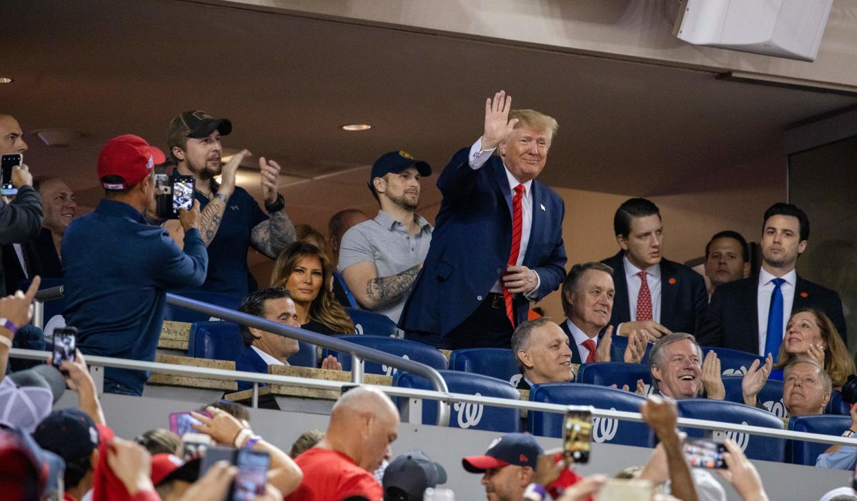 President Donald Trump at the World Series. (Photo by TASOS KATOPODIS/AFP via Getty Images)