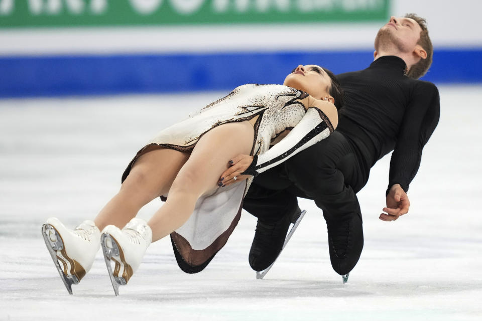 Madison Chock and Evan Bates, of the United States, perform their free dance program in the ice dance competition at the figure skating world championships in Montreal, Saturday, March 23, 2024. (Christinne Muschi/The Canadian Press via AP)