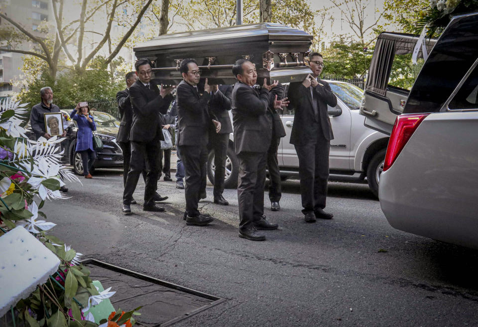 REMOVES REFERENCE TO HOMELESS KILLED - Pallbearers carry the casket of Chuen Kok from the Ng Fook Funeral Home in Manhattan's Chinese community, Friday Oct. 18, 2019, in New York. Kok, an 83-year-old homeless man whom Chinatown residents warmly greeted as "uncle," was one of four men bludgeoned to death in the community last week. (AP Photo/Bebeto Matthews)