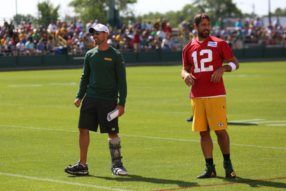 Green Bay Packers quarterback Aaron Rodgers (12) and Green Bay Packers head coach Matt LaFleur at training camp. (Getty Images)