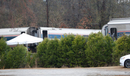 Emergency responders are at the scene after an Amtrak passenger train collided with a freight train and derailed in Cayce, South Carolina, U.S., February 4, 2018. REUTERS/Randall Hill