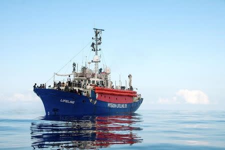 Migrants are seen on the deck of the Mission Lifeline rescue boat in the central Mediterranean Sea, June 21, 2018. Picture taken June 21, 2018. Hermine Poschmann/Misson-Lifeline/Handout via REUTERS