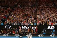 <p>Serena Williams turns to the crowd after beating her sister Venus </p>
