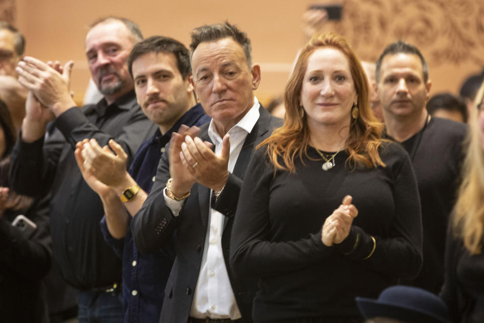 Bruce Springsteen and Patti Scialfa applauded as their son Sam Springsteen was sworn in as a Jersey City Fire Department recruit on Tuesday. (Photo: ASSOCIATED PRESS)