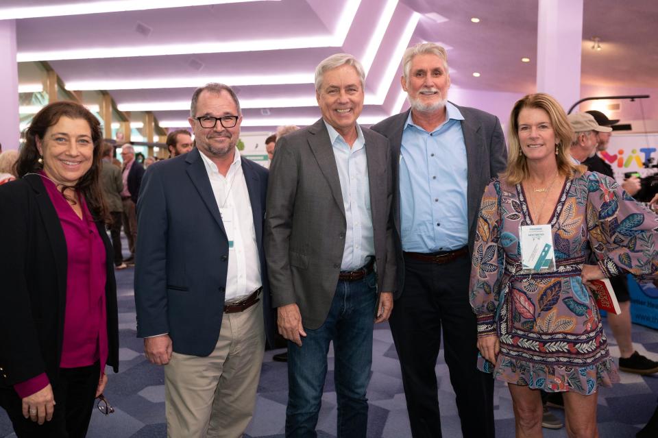 The EcoSummit on Dec. 5-6 was the largest environmental event series ever produced on the Suncoast. From left, SEC co-executive director Jennifer Shafer, Matt Sauer of the Charles & Margery Barancik Foundation, Carl Hiaasen, Jon Thaxton of the Gulf Coast Community Foundation, and EcoSummit sponsor Elizabeth Moore.