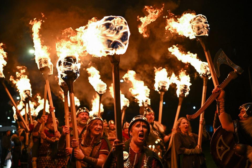 People dressed as Vikings from Shetland parade through the city to launch Celtic Connections in Glasgow, Scotland (Getty)