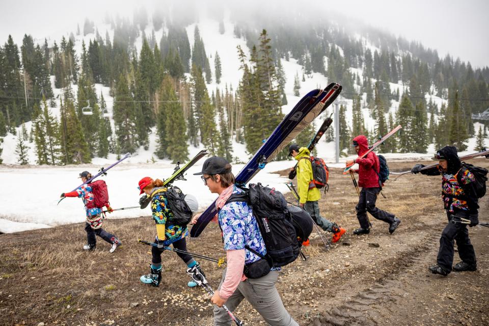 Parker Densmore, center, and friends start a backcountry ski tour at Alta Ski Area, which is closed for the season, on Friday, June 2, 2023. The group was celebrating Densmore’s 200th consecutive day of skiing this season. | Spenser Heaps, Deseret News