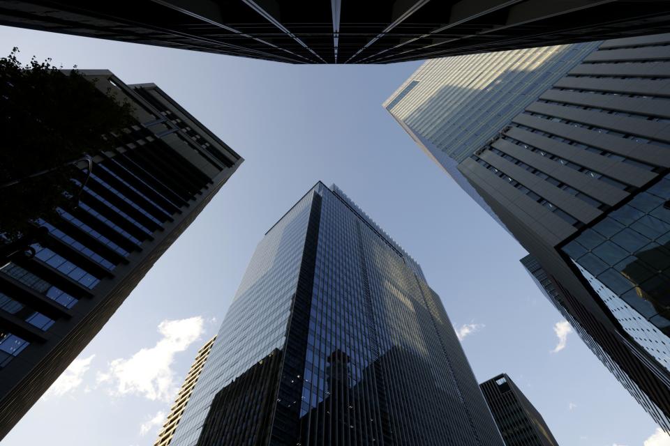 The Otemachi One Tower building, bottom, which houses the Norinchukin Bank head office in Tokyo, Japan, on Tuesday, Nov. 28, 2023. Photographer: Kiyoshi Ota/Bloomberg