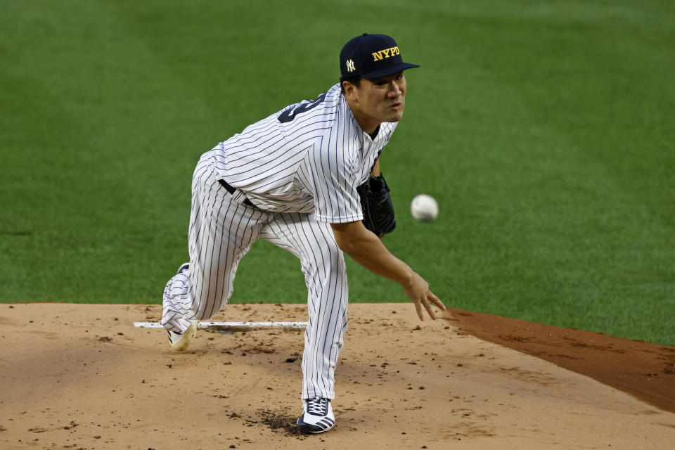 New York Yankees pitcher Masahiro Tanaka throws during the first inning of the second baseball game of the team's doubleheader against the Baltimore Orioles, Friday, Sept. 11, 2020, in New York. (AP Photo/Adam Hunger)