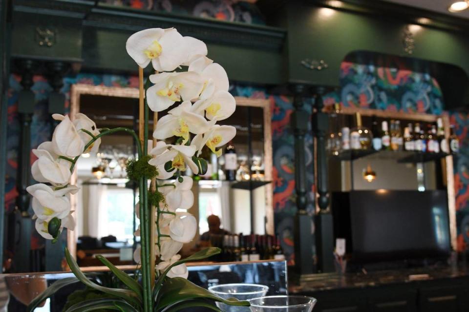 Orchids sit on the bar in Zavala at Barrington on Monday, June 17, 2024, in Macon, Georgia. Zavala began as a local catering business and moved to its Barrington Hall location in February, where renovations are ongoing in the club.