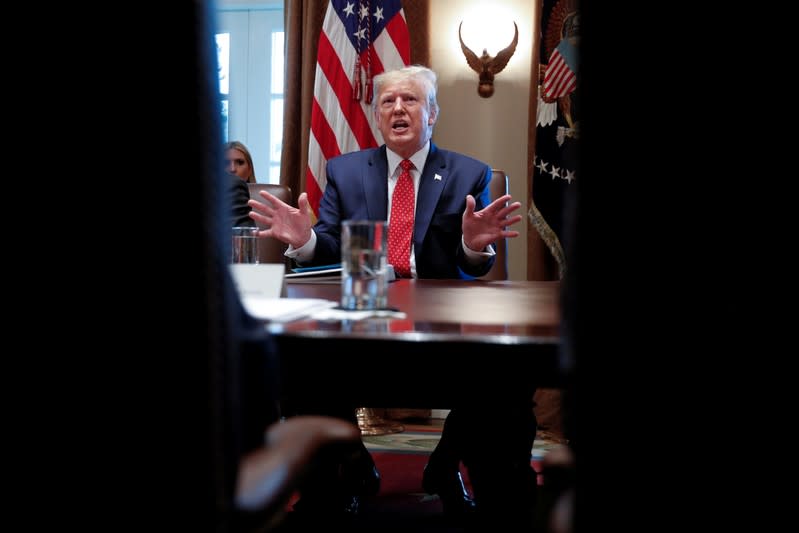 U.S. President Donald Trump hosts a Cabinet meeting inside the Cabinet Room of the White House in Washington