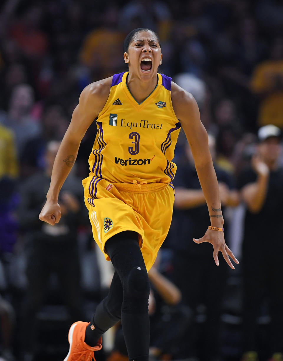 FILE - Los Angeles Sparks forward Candace Parker celebrates during the second half in Game 3 of the WNBA basketball finals, Sept. 29, 2017, in Los Angeles. The three-time WNBA champion has announced she's retiring. Parker, a two-time league MVP, announced in a social media post on Sunday, April 28, 2024 that she's ending her career after 16 seasons. (AP Photo/Mark J. Terrill, file)