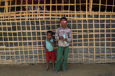 Rohingya boys poses for a picture in Balukhali refugee camp in Cox's Bazar, Bangladesh, January 20, 2018. REUTERS/Mohammad Ponir Hossain