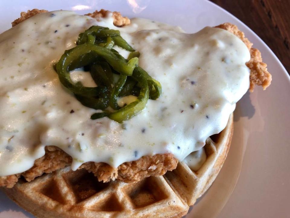 Chicken-fried chicken on a Belgian waffle with jalapeno cream gravy is on the brunch menu at Social House.