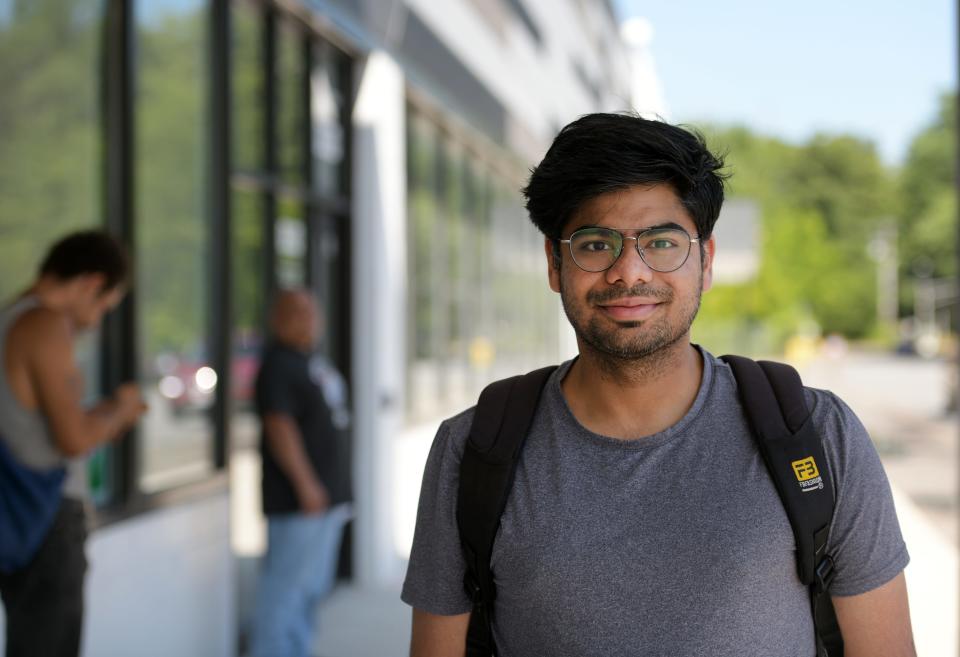 Raj Chowdary outside the new location. The new RMV opened Monday in the former Big Y supermarket off Route 20.