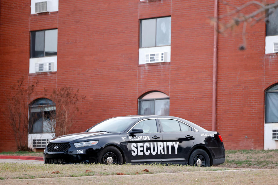 A security vehicle sits March 6 outside New Life Village in Edmond.