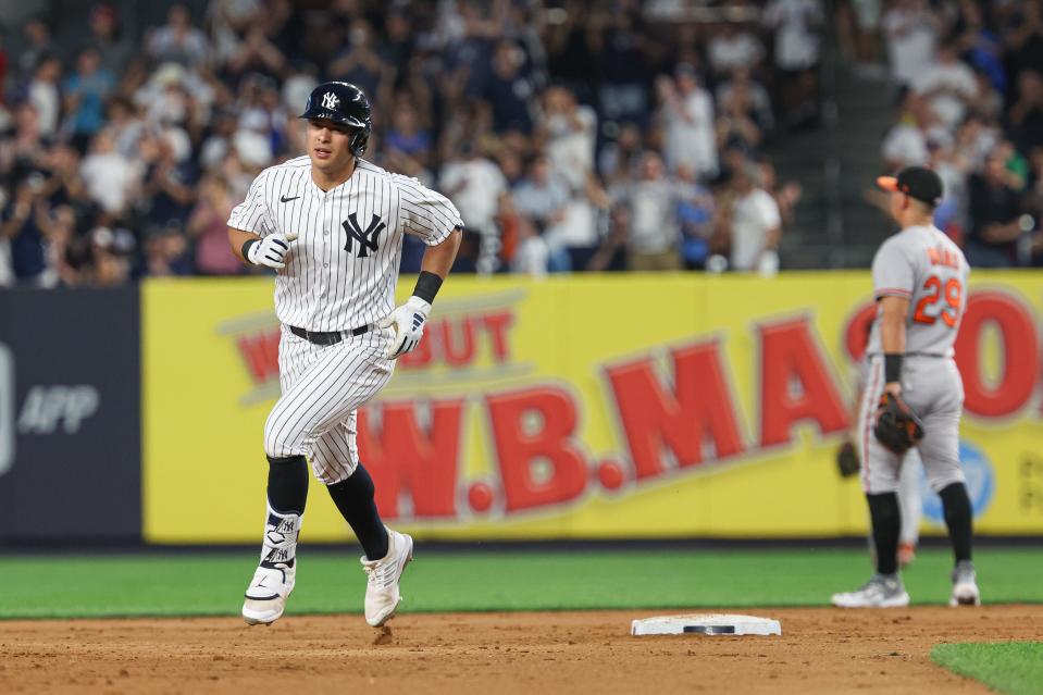 Jul 3, 2023; Bronx, New York, USA; New York Yankees shortstop Anthony Volpe (11) runs the bases after hitting a solo home run during the fifth inning against the Baltimore Orioles at Yankee Stadium. Mandatory Credit: Vincent Carchietta-USA TODAY Sports