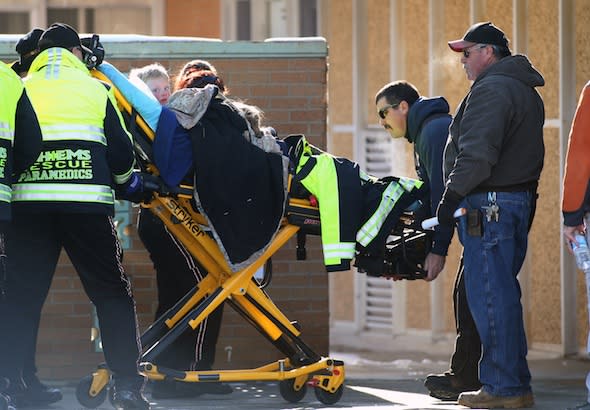 A group of six people arrive at Pershing General Hospital after being lost for two days in the frigid mountains near Lovelock, Nev., Tuesday, Dec. 10, 2013. (AP Photo/Cathleen Allison)