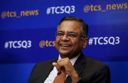 FILE PHOTO: Tata Consultancy Services (TCS) Chief Executive N. Chandrasekaran speaks during a news conference in Mumbai January 16, 2014. REUTERS/Danish Siddiqui/File Photo