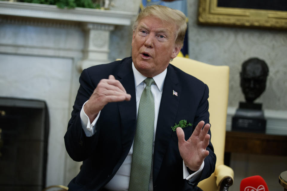 President Trump speaks to reporters inside the Oval Office of the White House in Washington, D.C., Thursday. (AP Photo/ Evan Vucci)