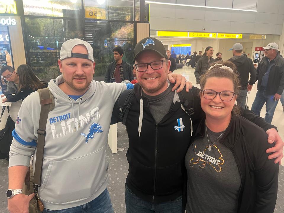 Tim Cryderman, 42; Matt Bigelow, 36, and Cera Bigelow, 32, prepare to board a plane from Denver to San Jose, California, on Friday, Jan. 26, 2024.The trio from Southgate are excited to cheer on the Detroit Lions, who play the San Francisco 49ers in the NFC Championship.