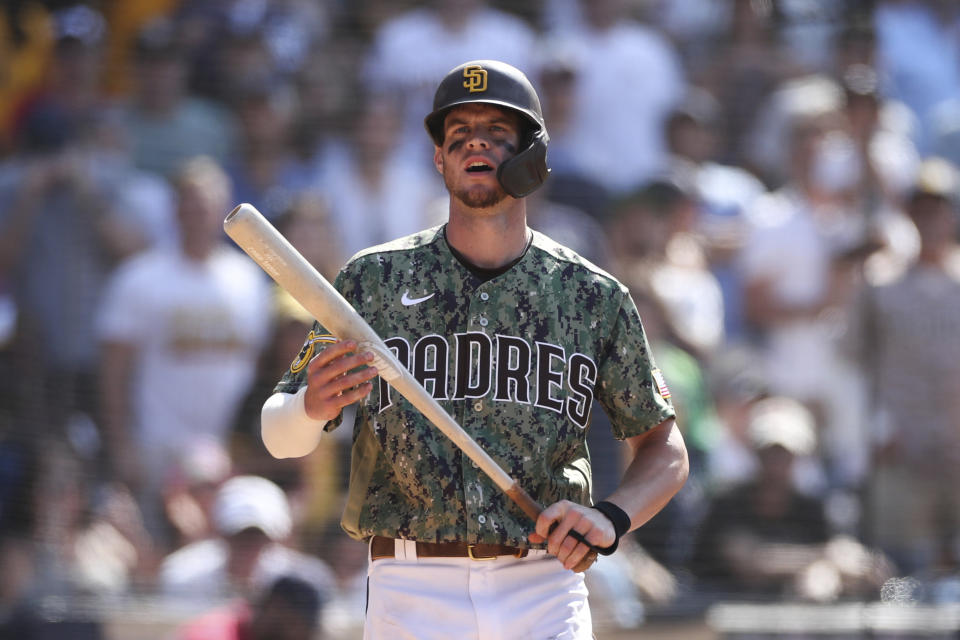 San Diego Padres' Wil Myers reacts after being called out on strikes in the ninth inning of a baseball game against the Colorado Rockies, Sunday, July 11, 2021, in San Diego. (AP Photo/Derrick Tuskan)