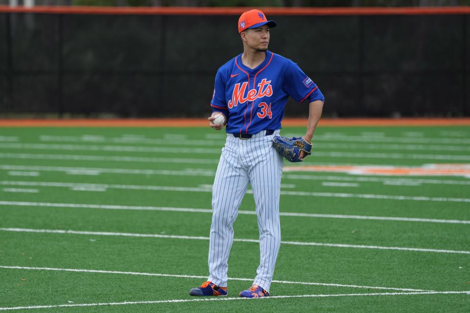 New York Mets starting pitcher Kodai Senga (34) warms-up during workouts on Feb. 19, 2024, at spring training in Port St. Lucie, Fla.