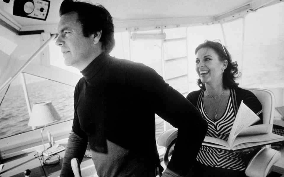 Natalie Wood with her husband Robert Wagner aboard Splendour in 1976 - Getty