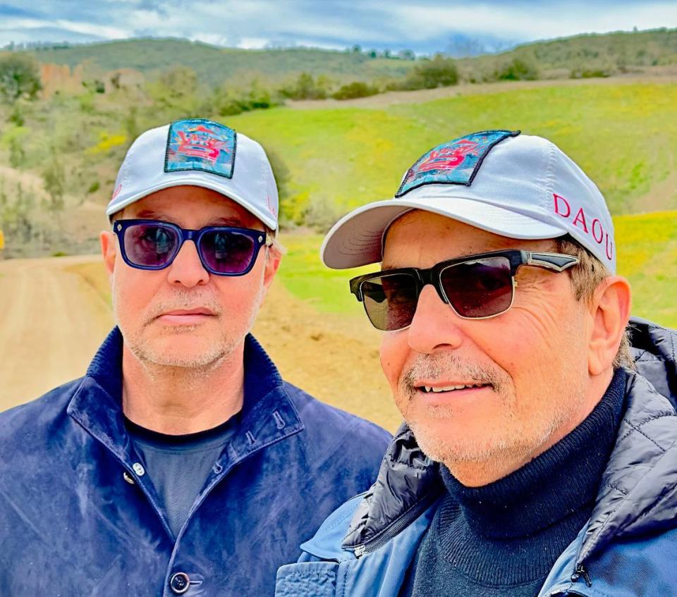 Daou Family Estates owners Daniel Daou, at left, and his brother Georges Daou pose for a picture on Friday, April 14, 2023, at their newly purchased property in Val d’Orcia region of Tuscany, Italy. They plan to build a winery, grow Bordeaux varietal grapes and restore a centuries-old farmhouse on the estate.