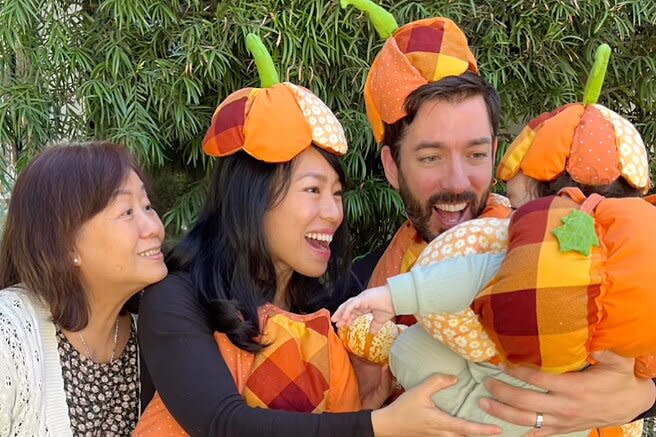 Drew and Linda Scott Pose in Sweet Homemade Pumpkin Costumes with Parker