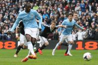 Yaya Toure scores Manchester City's opening goal from a penalty against Southampton at the Etihad Stadium in Manchester, northwest England, on April 5, 2014