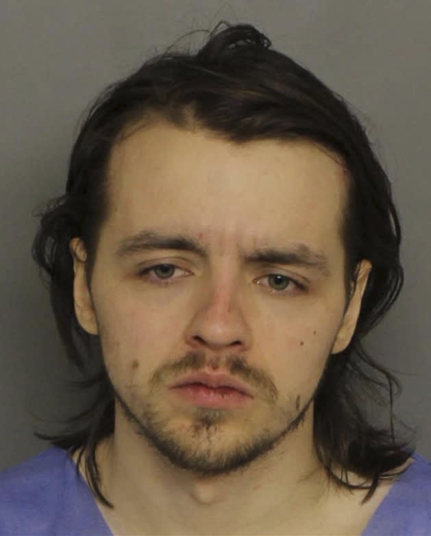 This mugshot provided by Baltimore County Police shows David Linthicum. Linthicum was taken into custody early Friday, Feb. 10, 2023, ending a 39-hour manhunt during which he wounded two Baltimore County police officers in separate shootings and holed up in a wooded area behind a suburban shopping center, authorities said. (Baltimore County Police via AP)