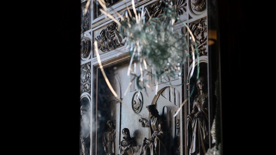 A ceremonial door to the U.S. Capitol behind broken glass in Washington, D.C., U.S., on Thursday, Jan. 7, 2021. Joe Biden was formally recognized by Congress as the next U.S. president early Thursday, ending two months of failed challenges by his predecessor, Donald Trump, that exploded into violence at the U.S. Capitol as lawmakers met to ratify the election result.