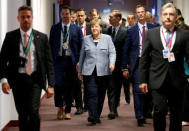 German Chancellor Angela Merkel arrives to attend a bilateral meeting with French President Emmanuel Macron (unseen) during a European Union leaders summit meeting in Brussels, Belgium October 19, 2017. REUTERS/Francois Lenoir