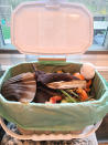 <p>"Composting is something I’ve been wanting to try for a while now, and I got lucky: just a few weeks ago, our town started a program. We drop our food scraps and food-soiled paper products into a small bucket in our kitchen (no smell, I promise!) and every week our waste management company picks it all up along with our garbage and recycling. I think a taxpayer program like this is still a rarity, but there are a lot of affordable private companies <a href="https://compostnow.org/compost-services/" rel="nofollow noopener" target="_blank" data-ylk="slk:near major U.S. citie;elm:context_link;itc:0;sec:content-canvas" class="link ">near major U.S. citie</a>s that will take your food scraps — and some will even process and return them to you to use in your yard. Food waste accounts for more than 25 percent of landfill material and can emit harmful gases when decomposing, so this small step we’re taking as a family feels like it could eventually lead to big change."</p> <p>— <b>Kate Hogan, Digital Specials Director</b></p>