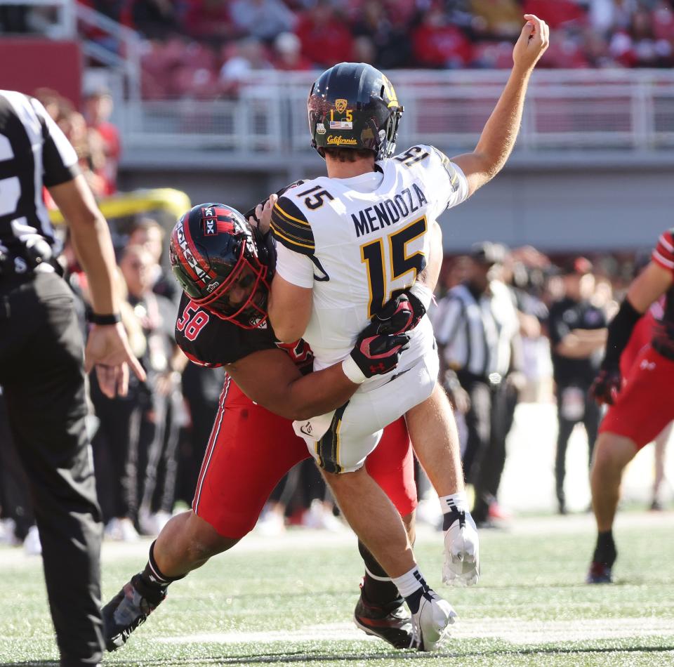 Utah Utes defensive tackle Junior Tafuna (58) hurries California Golden Bears quarterback Fernando Mendoza (15) and injures him in Salt Lake City on Saturday, Oct. 14, 2023. Utah won 34-14. | Jeffrey D. Allred, Deseret News