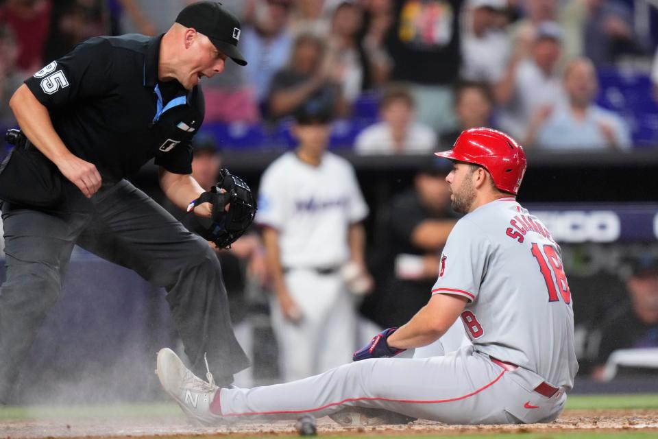 Nolan Schanuel #18 of the Los Angeles Angels is called out by umpire Stu Scheurwater during the fifth inning of a game against the Miami Marlins at loanDepot park on April 02, 2024 in Miami, Florida.