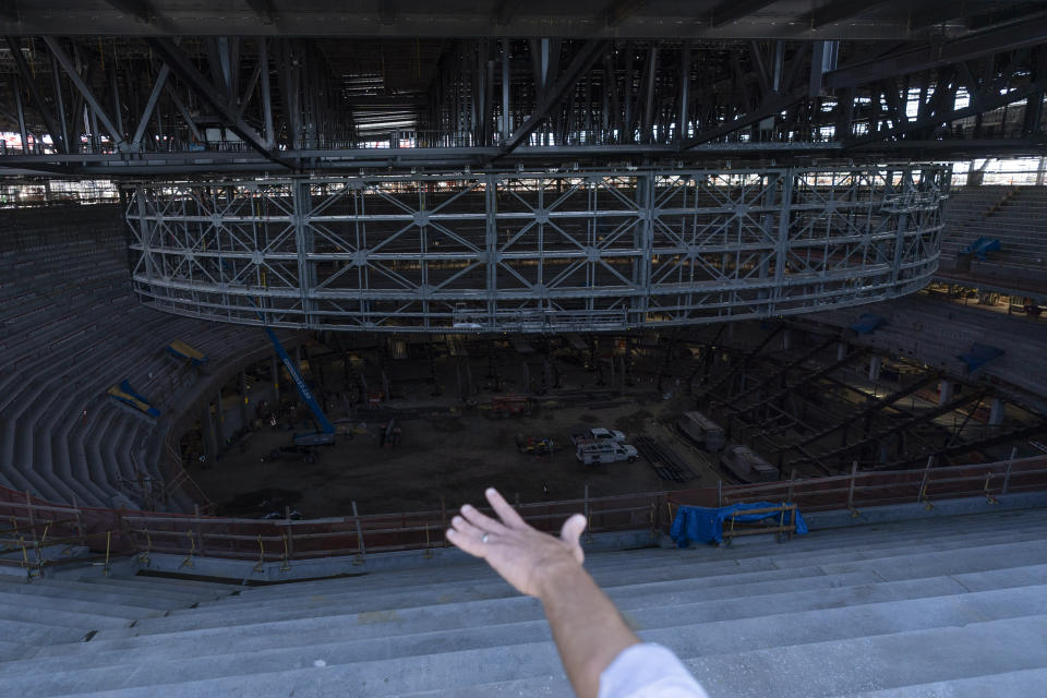 Project executive Craig Bojda points to the massive frame structure of a LED display during a media tour of the Los Angeles Clippers' Intuit Dome in Inglewood, Calif., Thursday, June 22, 2023. The arena is expected to be completed in time for the 2024-25 NBA season. (AP Photo/Jae C. Hong)