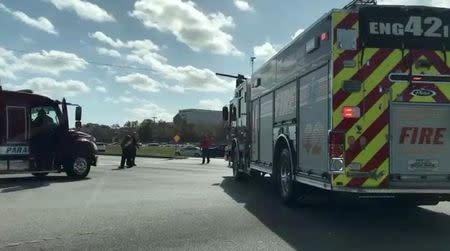 A firetruck is seen near Marjory Stoneman Douglas High School following a shooting incident in Parkland, Florida, U.S. February 14, 2018 in this still image from a video obtained by social media. Instagram/@Dann_Edu/via REUTERS