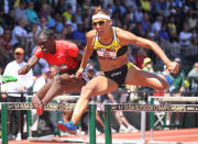 Lolo Jones clears a hurdle during the first round of the Women's 100 meter hurdles during the 2011 USA Outdoor Track & Field Championships at Hayward Field on June 25, 2011 in Eugene, Oregon. (Photo by Andy Lyons/Getty Images)